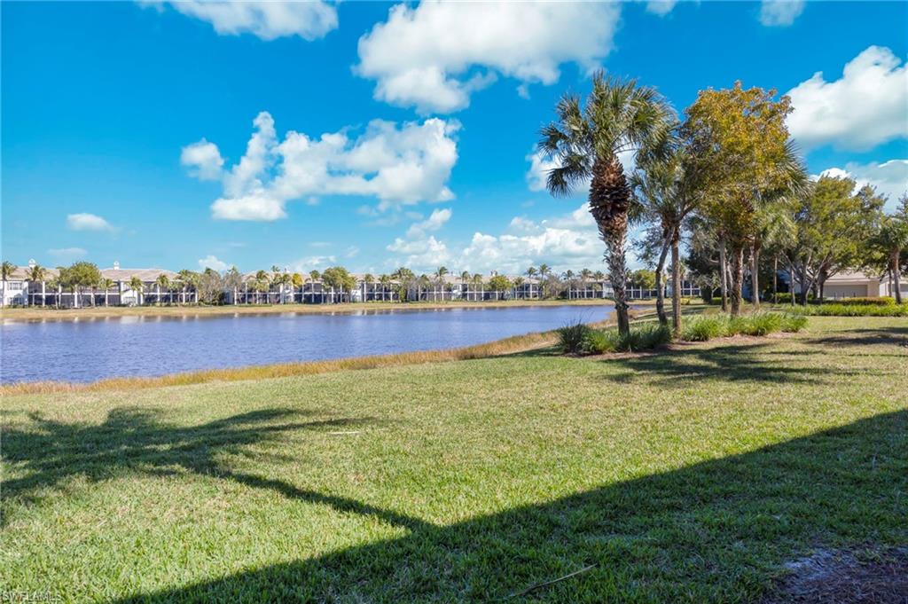 9288 Grassi Way, Unit 102 Naples, FL 34114 - Photo 25 of 37 Water view featuring nearby suburban area