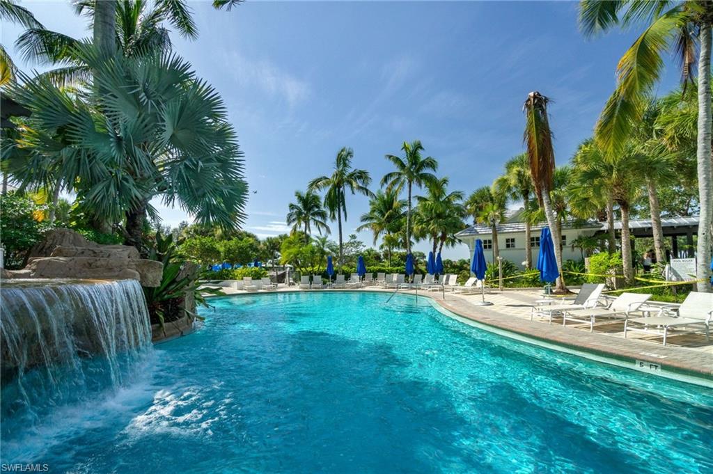 9288 Grassi Way, Unit 102 Naples, FL 34114 - Photo 29 of 37 Fiddler's Community pool with a patio area