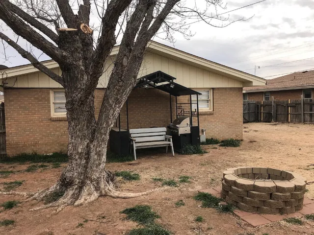 a car parked in front of a house