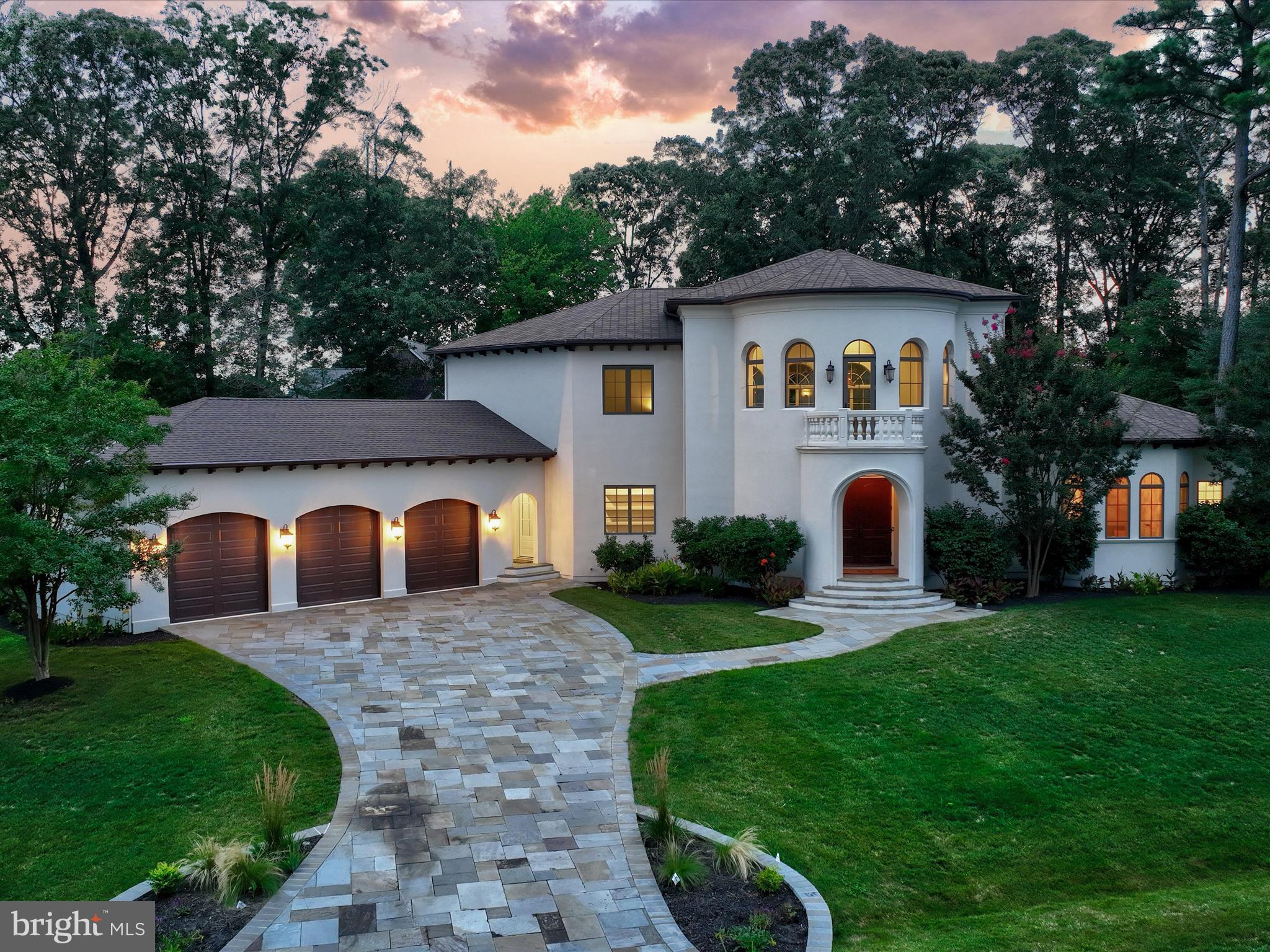 Hardscape driveway leads you home