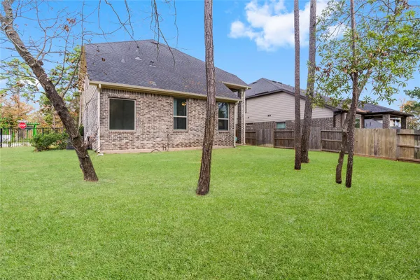 $395,000 | 313 Serenata Woods Trail, Conroe, TX 77318
