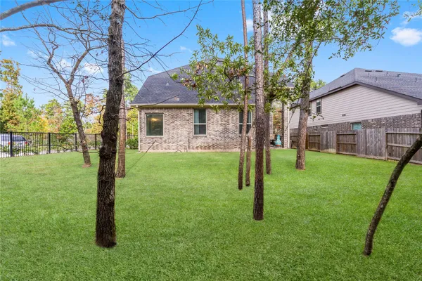 $395,000 | 313 Serenata Woods Trail, Conroe, TX 77318