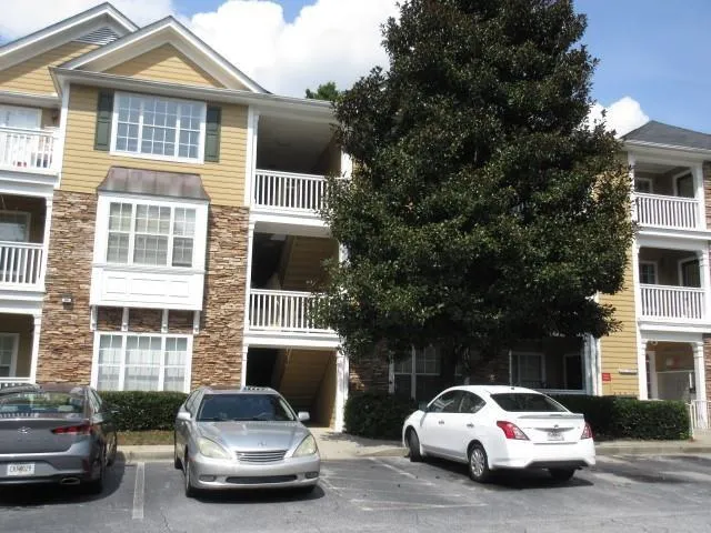 a car parked in front of a house