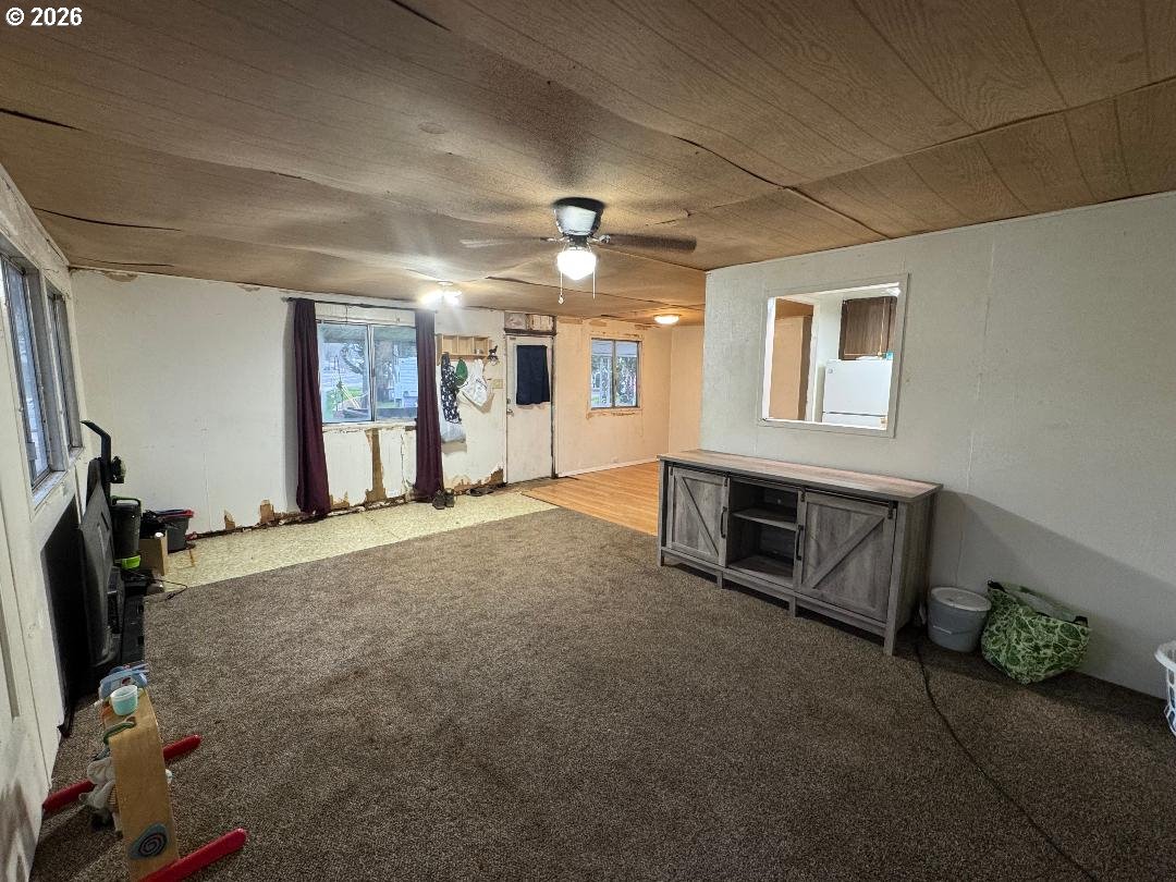 5000 Northeast Stephens Street, Unit 2 Roseburg, OR 97470 - Photo 22 of 23 a view of a livingroom with furniture and a window