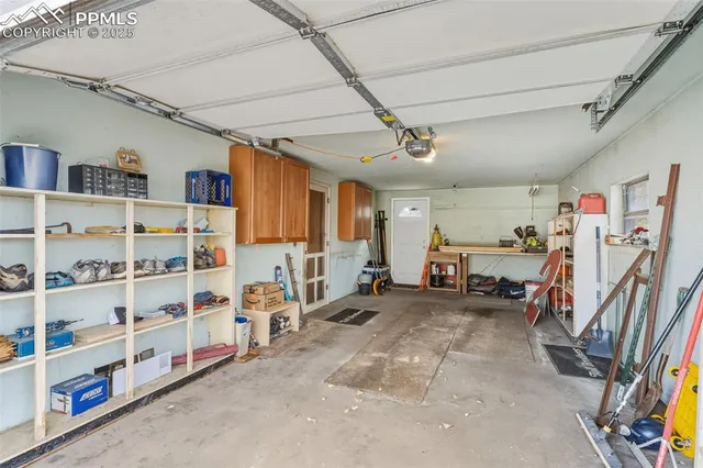a view of a livingroom with shelves