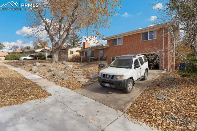 a car parked in front of a house