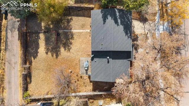 a aerial view of residential houses with outdoor space