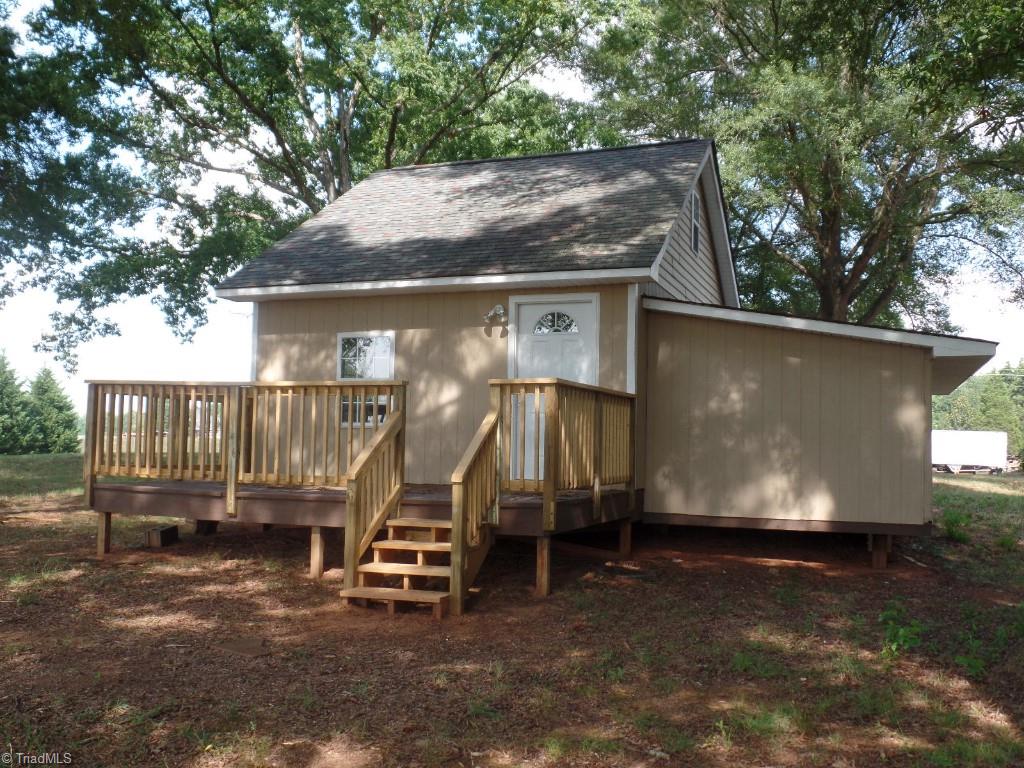 1939 Bloomtown Road East Bend, NC 27018 - Photo 21 of 26 Playhouse and storage building.