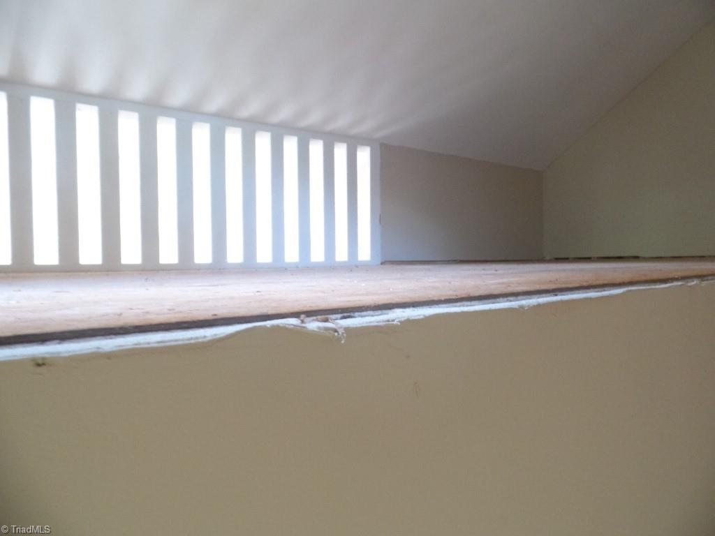 1939 Bloomtown Road East Bend, NC 27018 - Photo 22 of 26 unfinished loft, just needs flooring, carpet or use for extra storage.