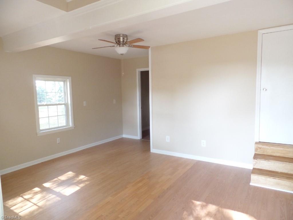 1939 Bloomtown Road East Bend, NC 27018 - Photo 24 of 26 Inside of playhouse, great space, does feature a unfinished loft.