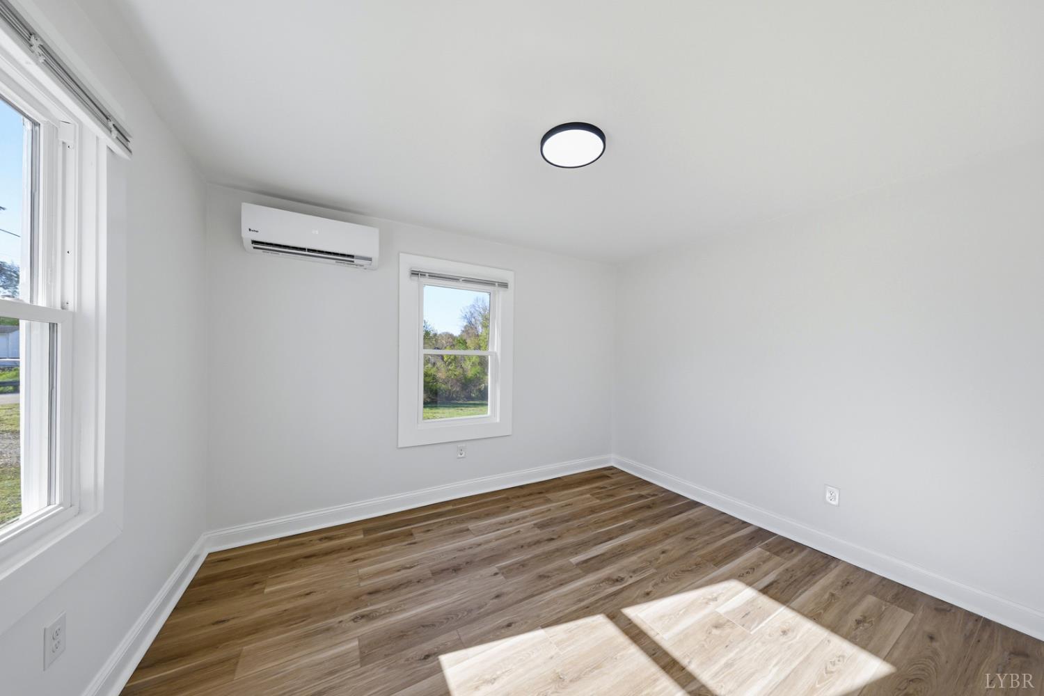 1410 Lynch Road Altavista, VA 24517 - Photo 13 of 34 an empty room with a window