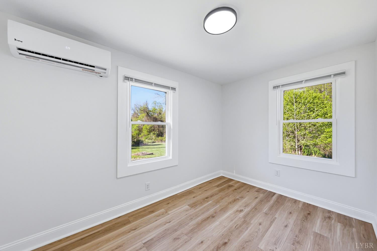 1410 Lynch Road Altavista, VA 24517 - Photo 18 of 34 an empty room with windows
