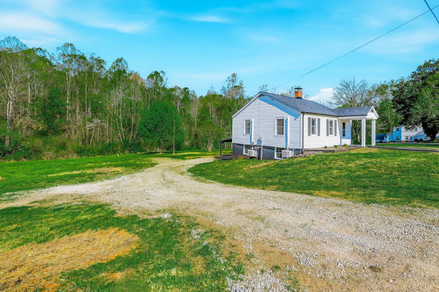 1410 Lynch Road Altavista, VA 24517 - Photo 29 of 34 a view of a house with yard and green space