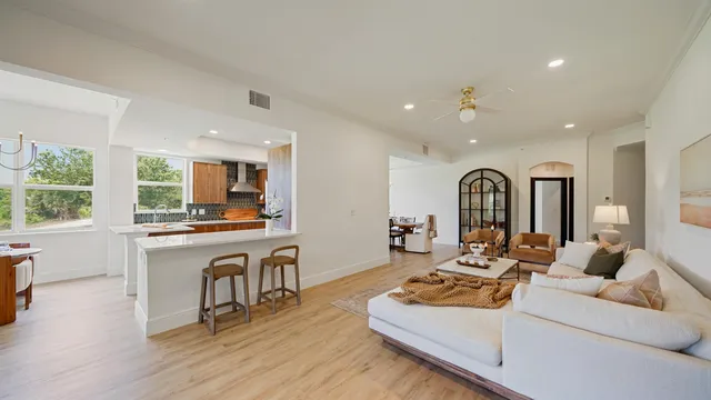 a very nice looking kitchen with a large window