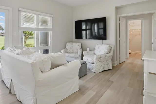 a living room with furniture and window