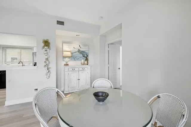 a view of a livingroom with furniture and wooden floor