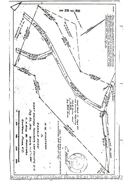 Valley Road Sanford, NC 27330 - Photo 5 of 5 a picture of a glass window with a white house and wooden fence
