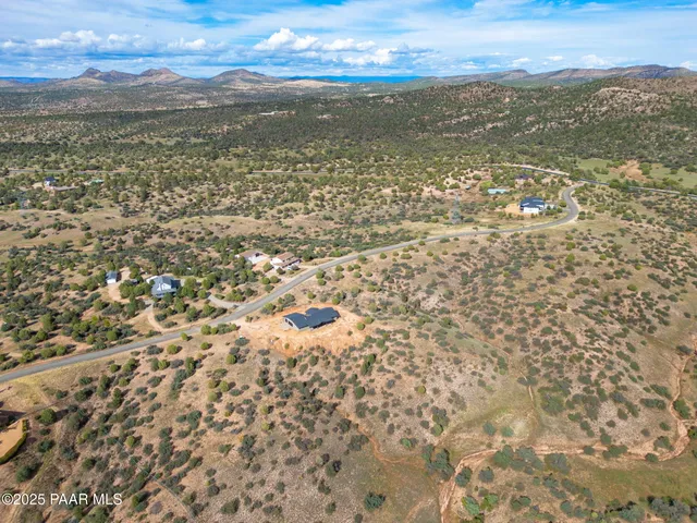 a view of an ocean and a mountain