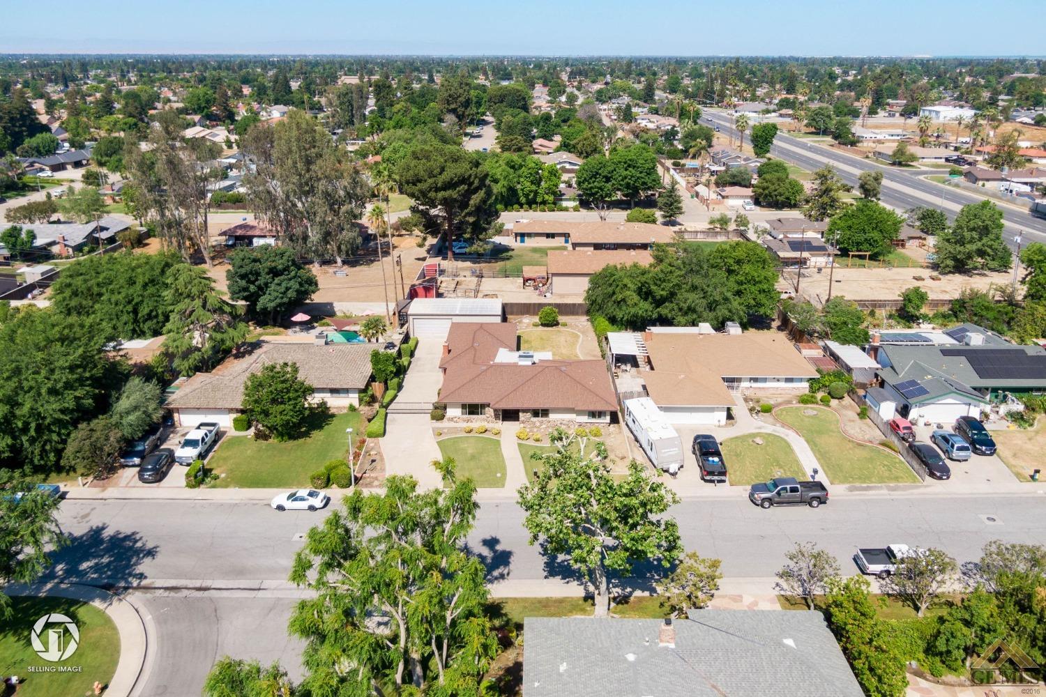 Undisclosed Address Bakersfield, CA 93308 - Photo 40 of 45 an aerial view of residential houses with outdoor space