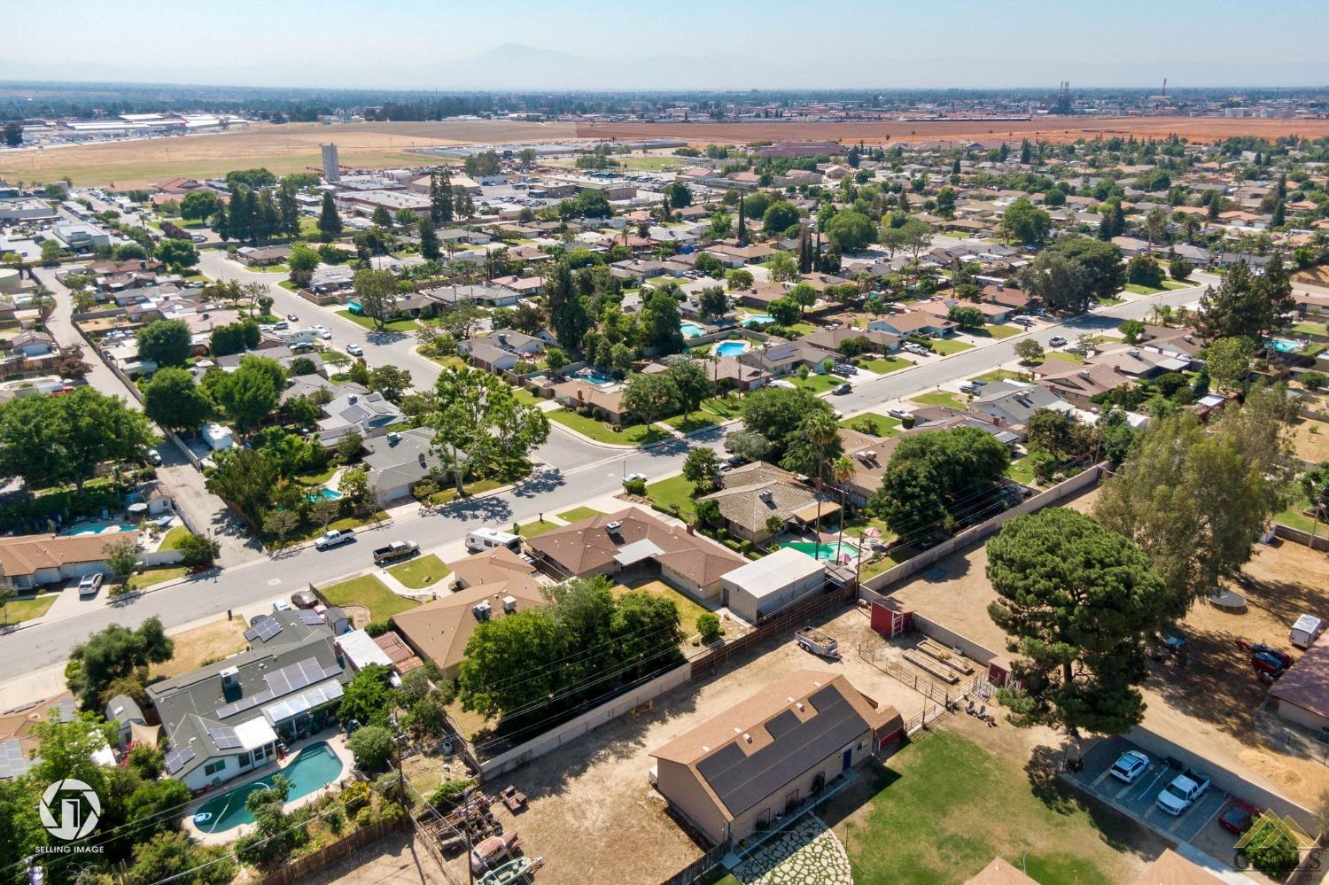 Undisclosed Address Bakersfield, CA 93308 - Photo 45 of 45 an aerial view of a city with lots of residential buildings