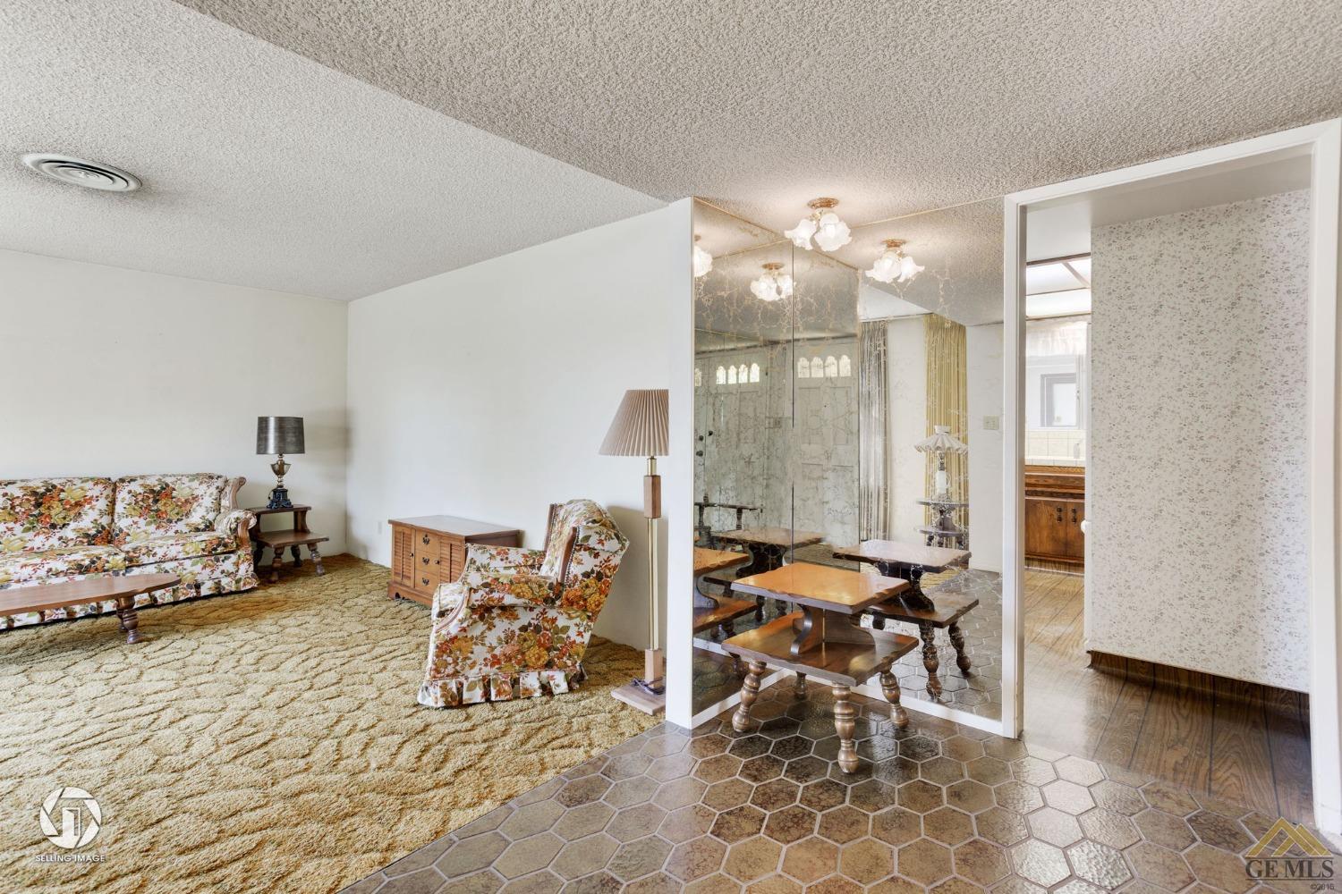 Undisclosed Address Bakersfield, CA 93308 - Photo 9 of 45 a view of a livingroom with furniture and a couch