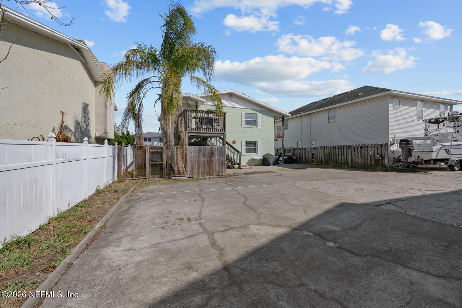 1914 First Street Neptune Beach, FL 32266 - Photo 11 of 55 a view of a house with a patio