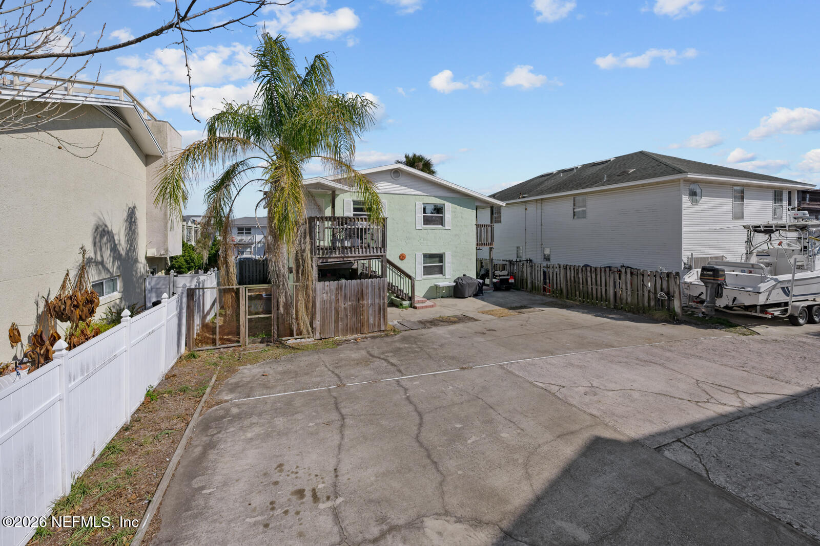 1914 First Street Neptune Beach, FL 32266 - Photo 12 of 55 a view of a house with a patio