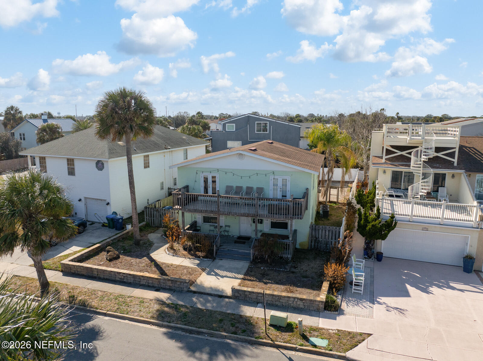 1914 First Street Neptune Beach, FL 32266 - Photo 20 of 55 a view of a house with yard and sitting area