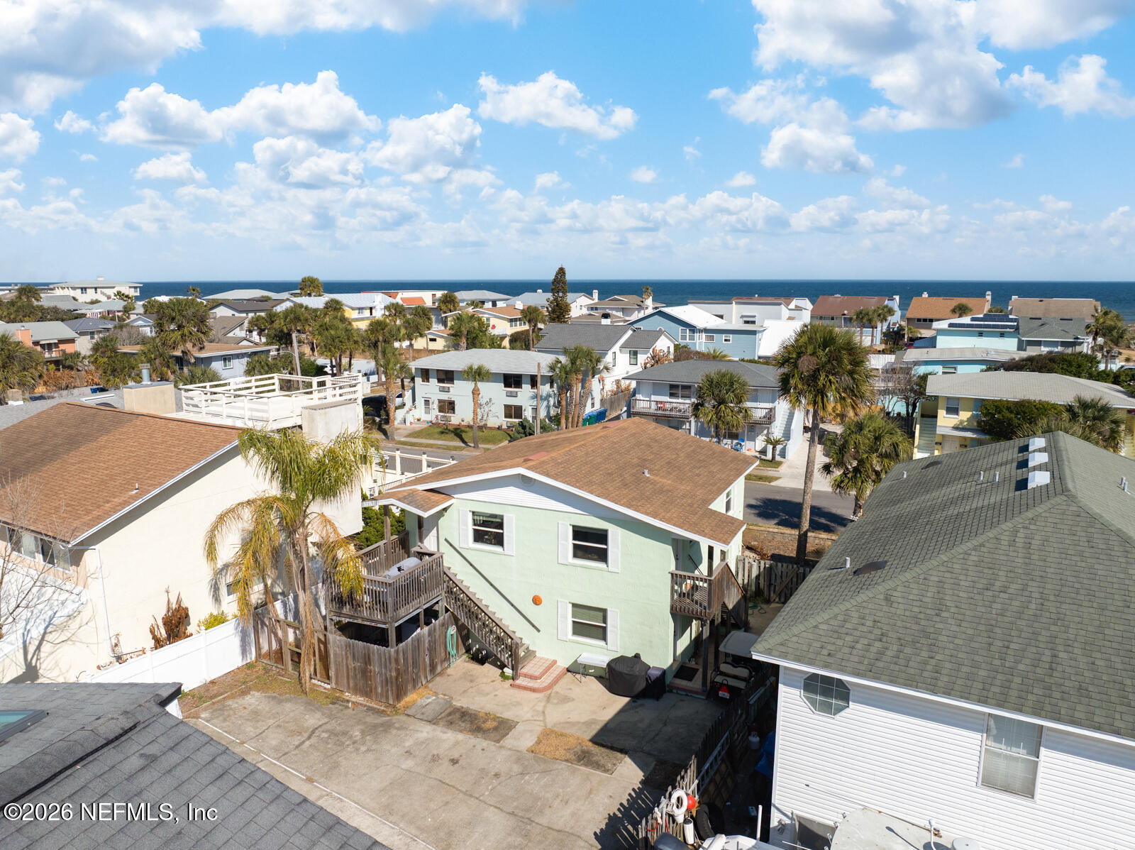 1914 First Street Neptune Beach, FL 32266 - Photo 23 of 55 a view of a city with lawn chairs