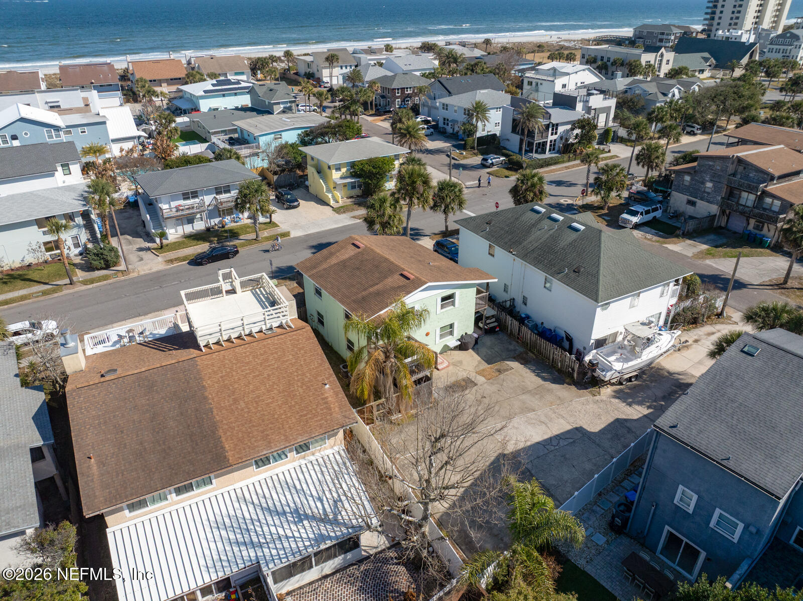 1914 First Street Neptune Beach, FL 32266 - Photo 42 of 55 an aerial view of a house with parking space