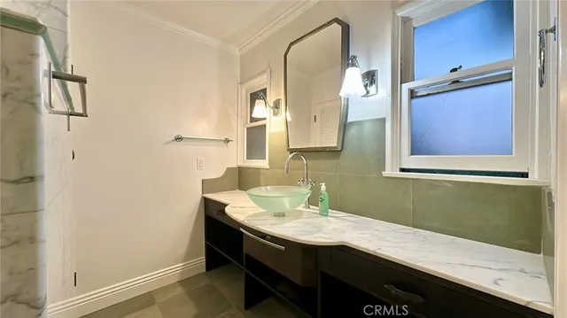 a bathroom with a sink and a bathtub