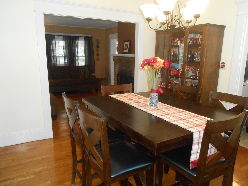 32 Larkspur Street Springfield, MA 01108 - Photo 4 of 26 a dining room with furniture and chandelier