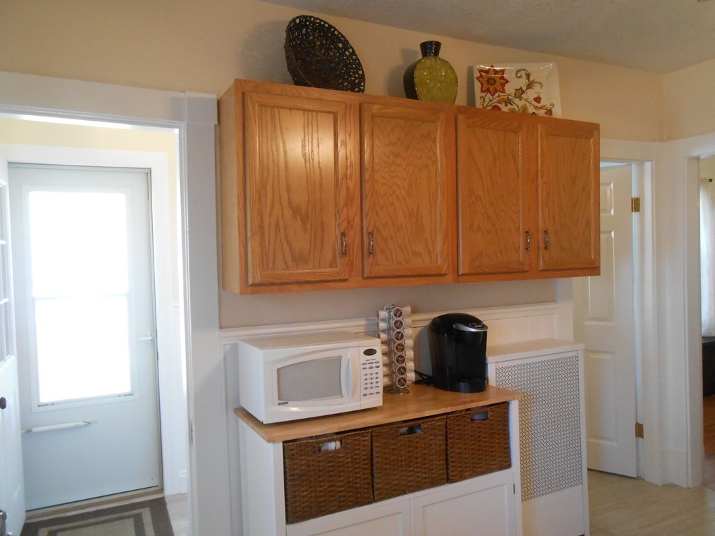 32 Larkspur Street Springfield, MA 01108 - Photo 7 of 26 a view of a kitchen with electric appliances