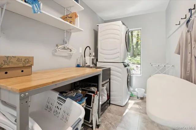 a bathroom with a sink a mirror and a toilet