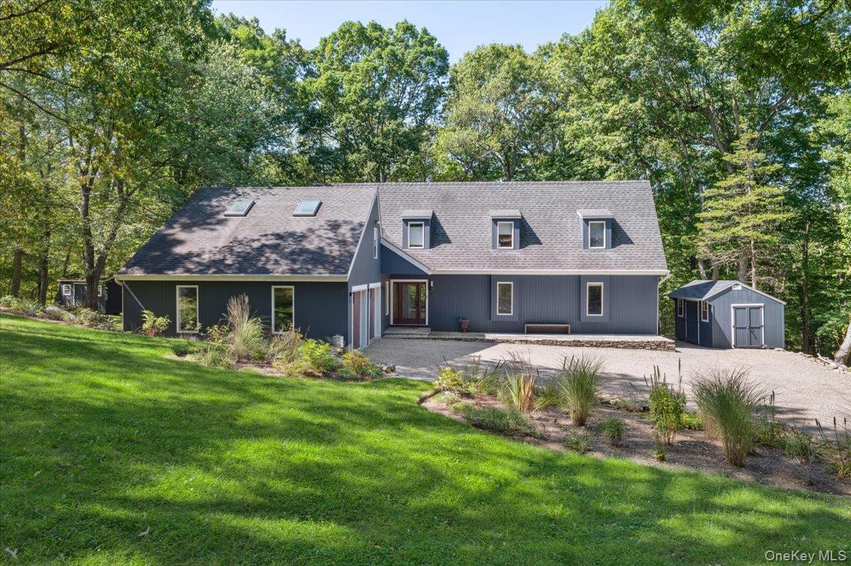 46 Ridgefield Avenue South Salem, NY 10590 - Photo 2 of 38 a front view of house with yard outdoor seating and green space
