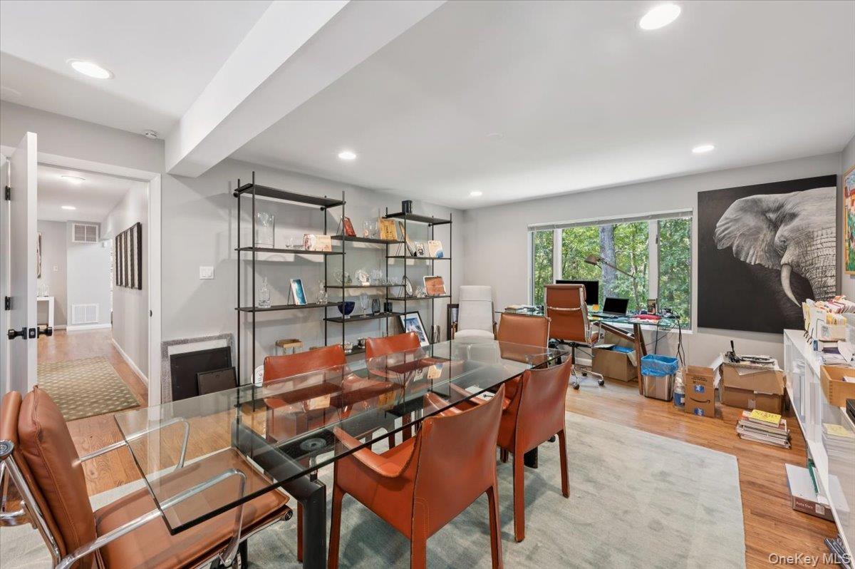 46 Ridgefield Avenue South Salem, NY 10590 - Photo 21 of 38 a outdoor kitchen with a large window and dining table