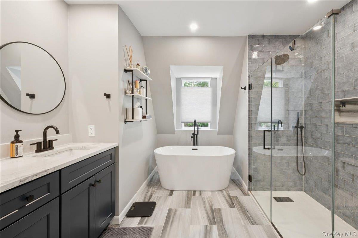 46 Ridgefield Avenue South Salem, NY 10590 - Photo 27 of 38 a bathroom with a double vanity sink mirror and shower