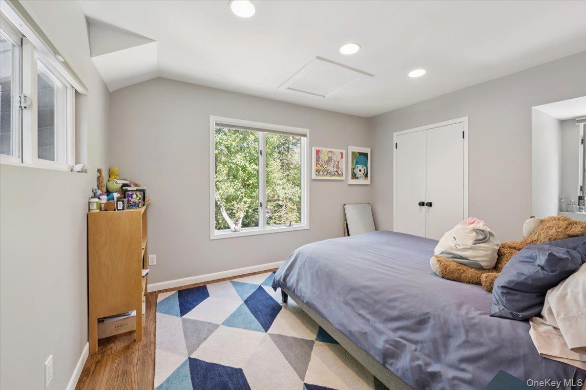 46 Ridgefield Avenue South Salem, NY 10590 - Photo 29 of 38 a bedroom with a bed and wooden floor