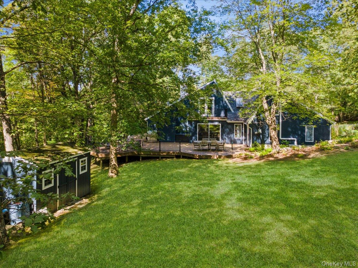 46 Ridgefield Avenue South Salem, NY 10590 - Photo 35 of 38 a backyard of a house with table and chairs