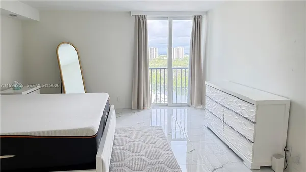 a view of livingroom with furniture and window