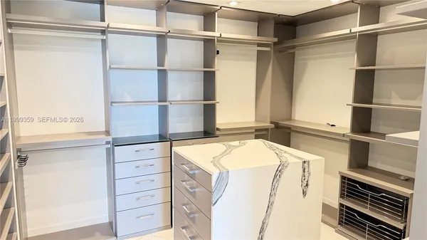 a kitchen with a stove and a refrigerator