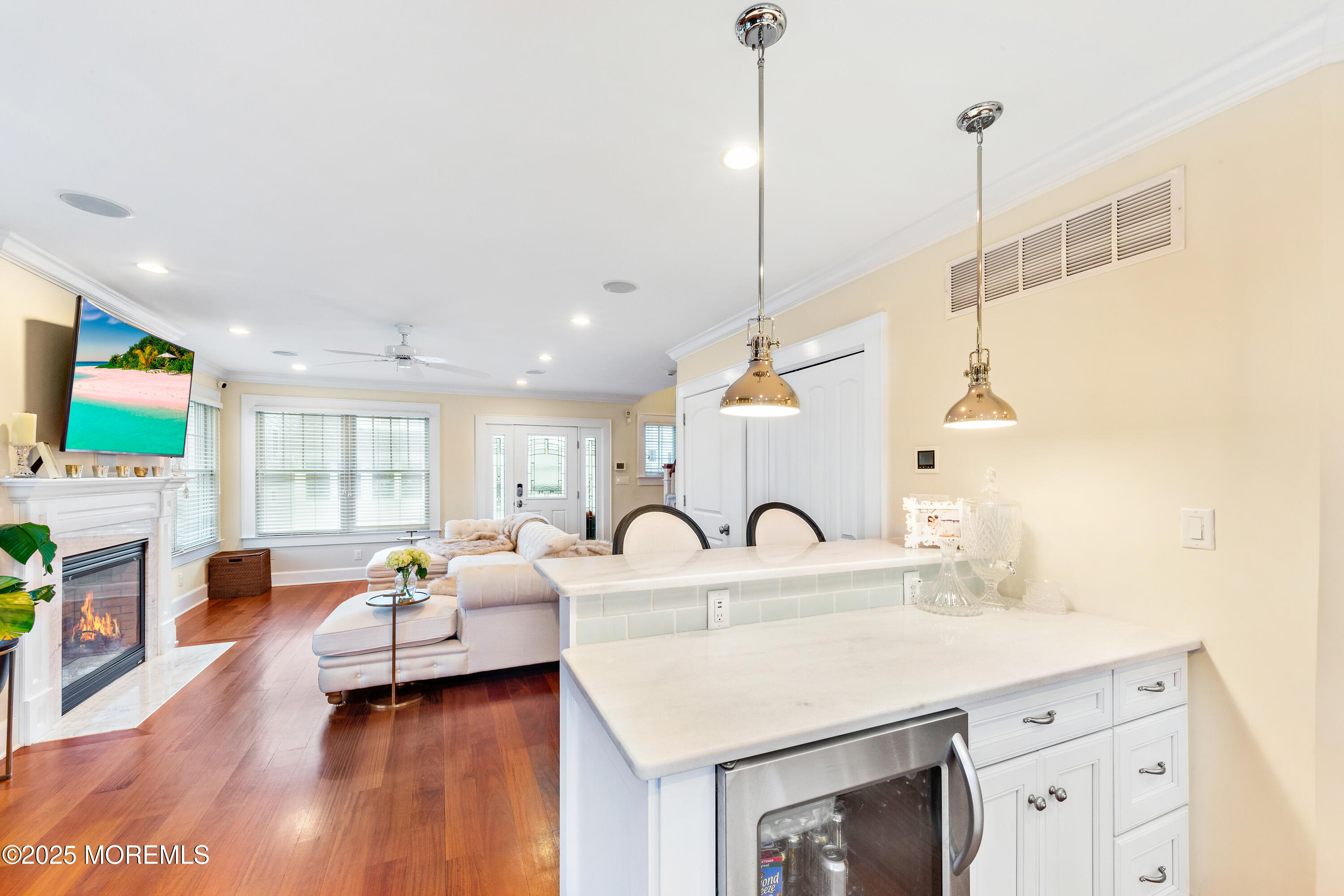 6 Via Ripa Sea Bright, NJ 07760 - Photo 11 of 25 a living room with fireplace furniture and a wooden floor