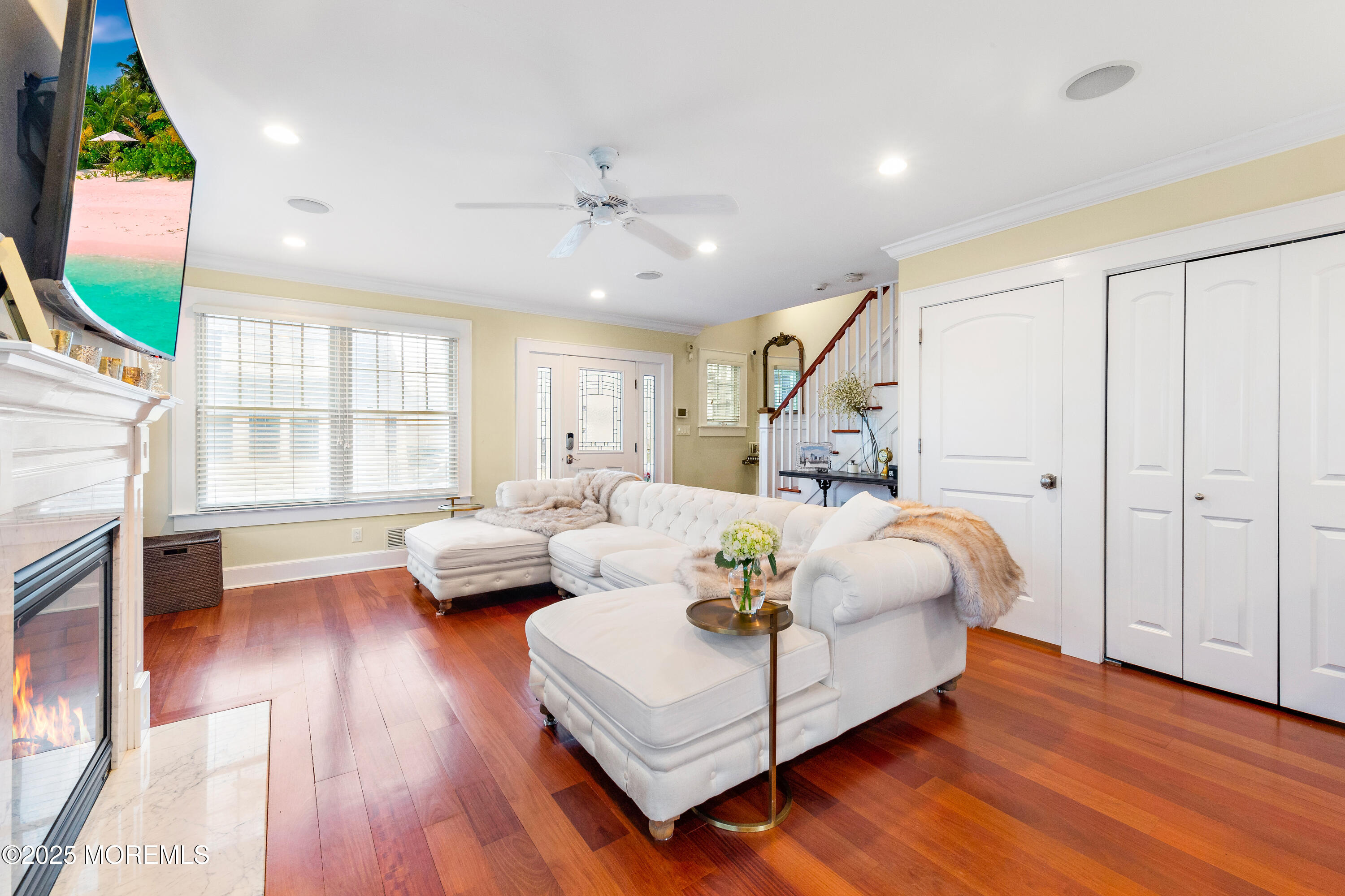 6 Via Ripa Sea Bright, NJ 07760 - Photo 12 of 25 a living room with furniture fireplace and wooden floor