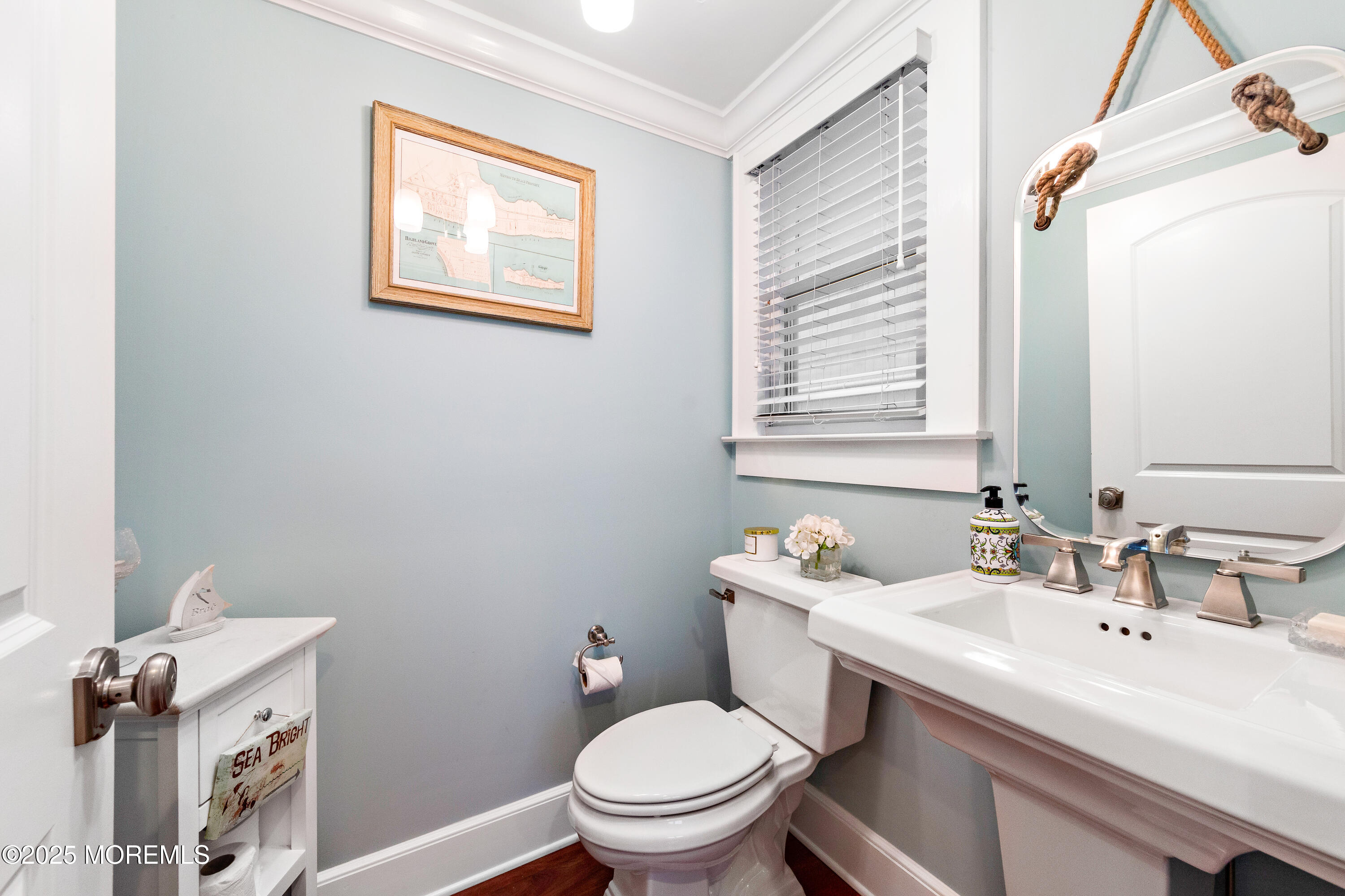 6 Via Ripa Sea Bright, NJ 07760 - Photo 14 of 25 a bathroom with a toilet sink and mirror