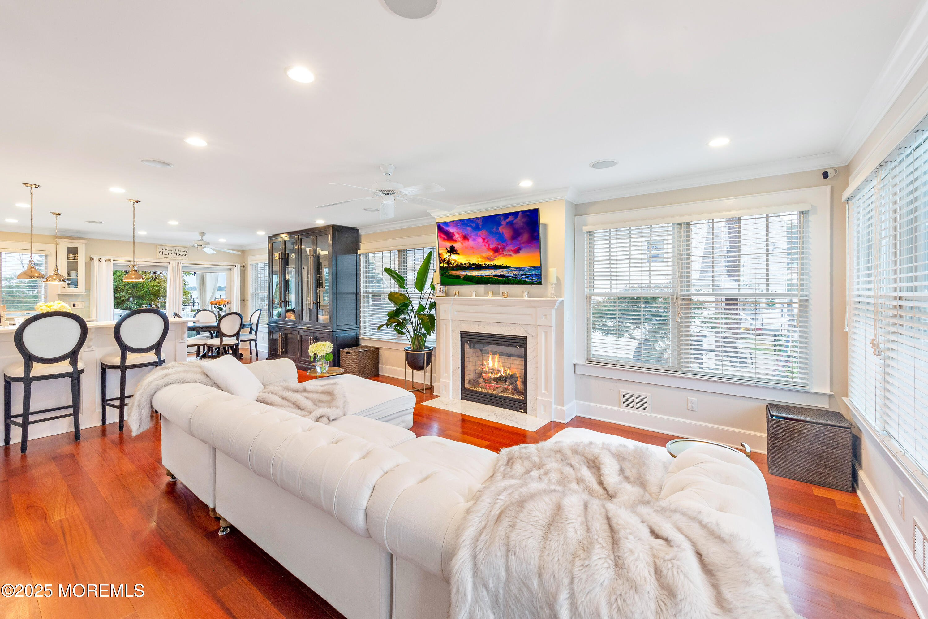 6 Via Ripa Sea Bright, NJ 07760 - Photo 3 of 25 a spacious bedroom with a bed and a fireplace