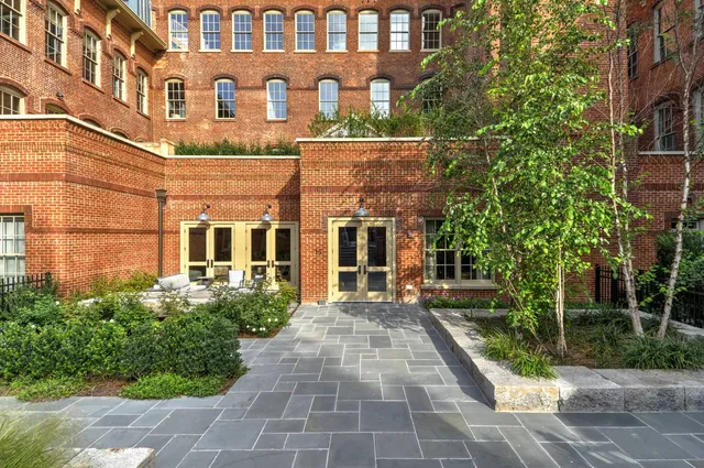a view of a house with a chairs