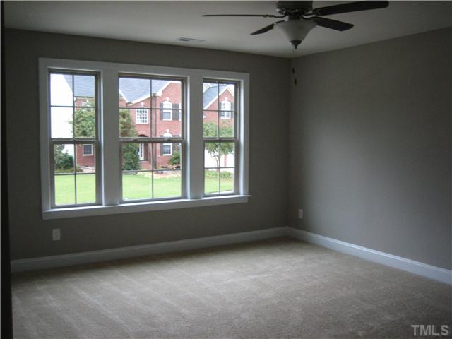 2133 Lower Lake Road Wake Forest, NC 27587 - Photo 16 of 25 One of the 3 Bedroom upstairs, plenty of windows for natural light, and walk in closet