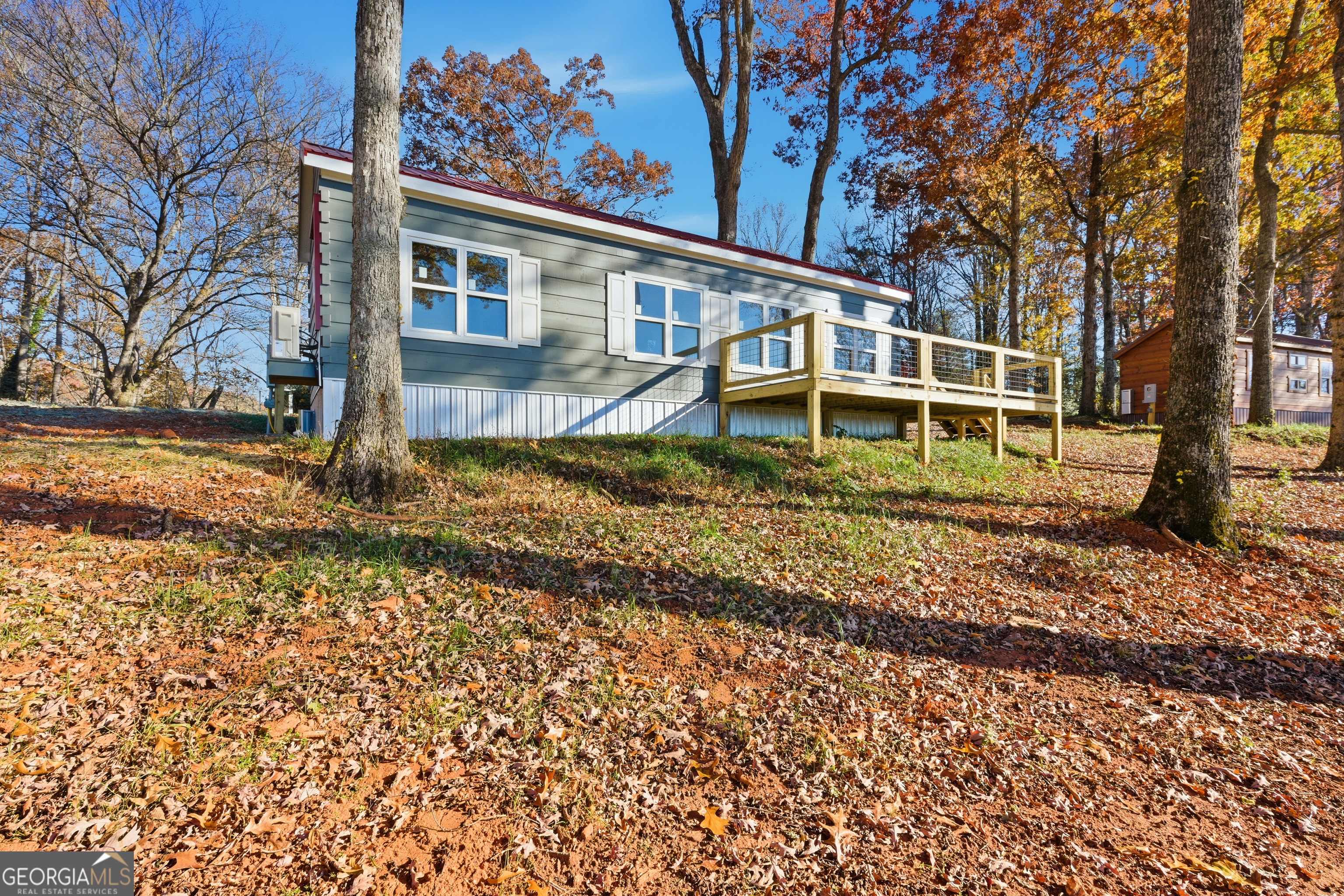527 Saunders Road Franklin, NC 28734 - Photo 5 of 19 a view of a house with a yard