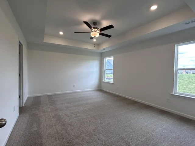 a bathroom with a shower and a sink