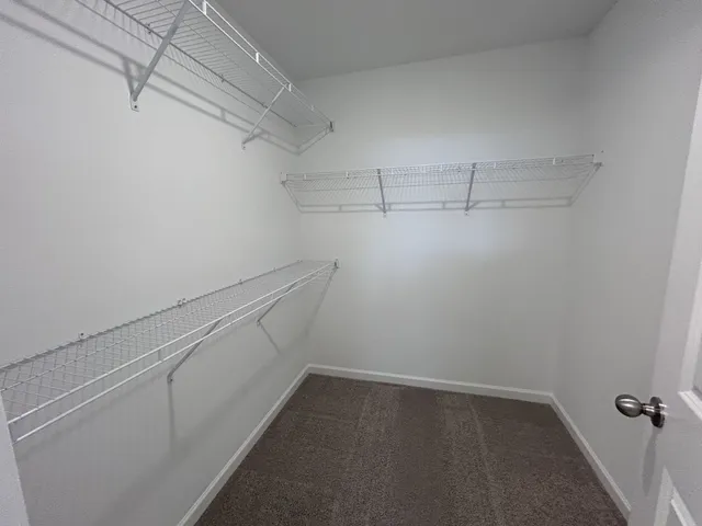 a view of a room with racks on the wall